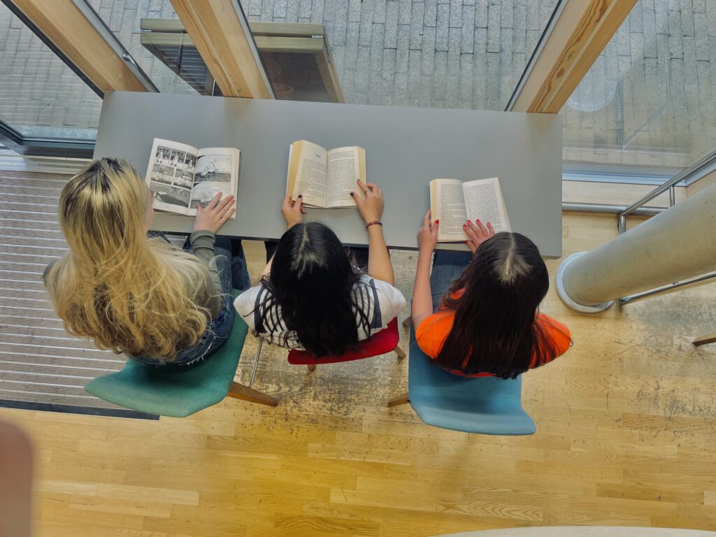 Group of Easter Revision Course Students Reading English Literature