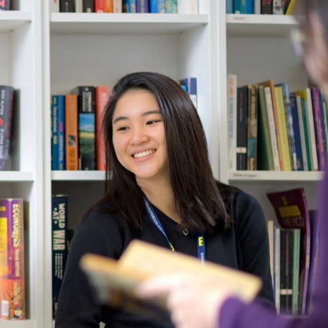 Student engaging in group discussion